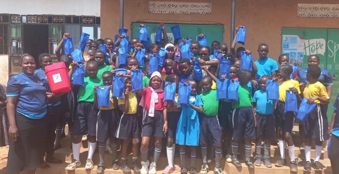 Girls receiving reusable sanitary kits